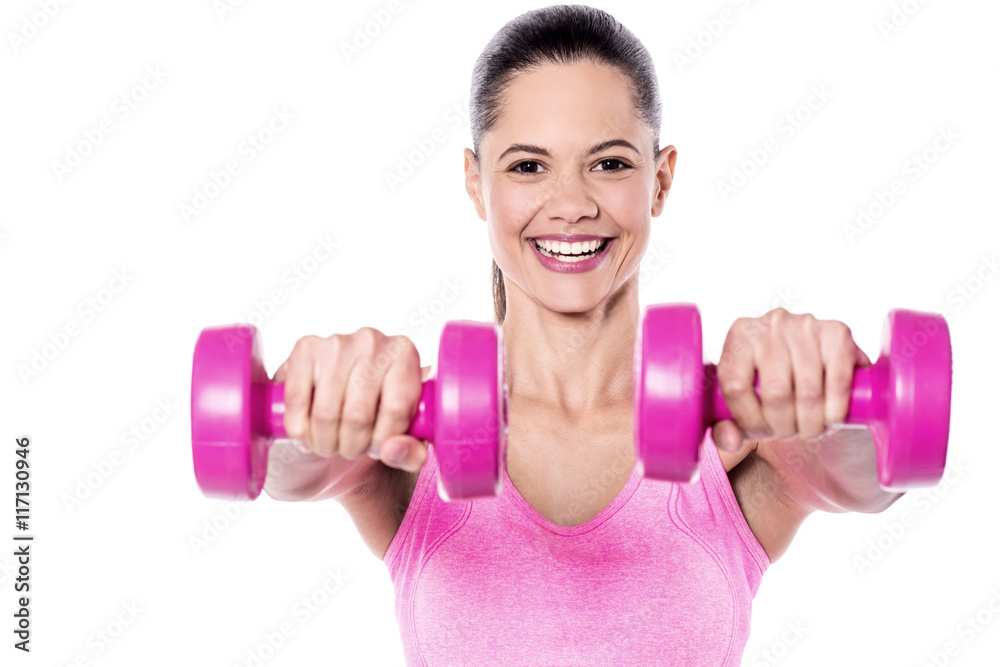 Fitness model working out with dumbbells Fitness model working out with dumbbells