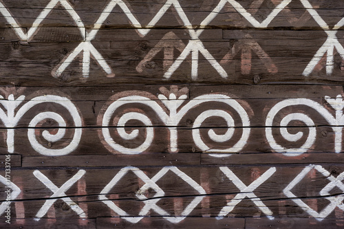 Quadro su tela Close view of decoration of log houses used in village of Cicmany, UNESCO World