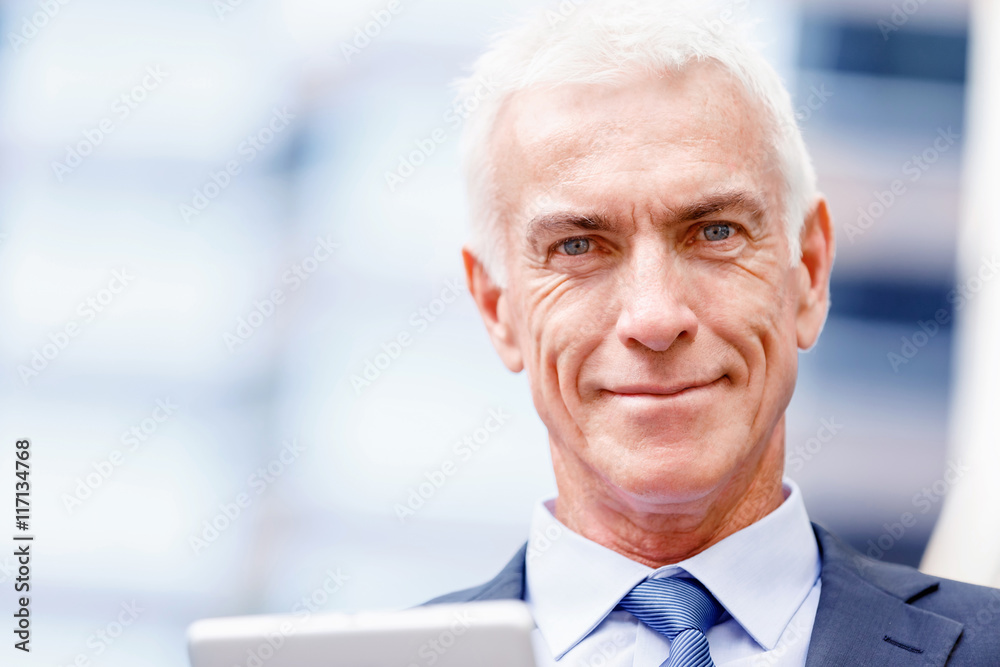 Portrait of confident businessman outdoors Portrait of confident businessman outdoors