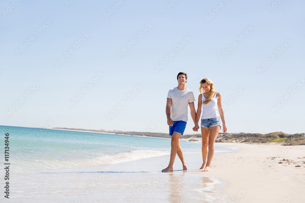 Romantic young couple on the beach