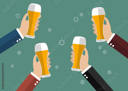 Businessmen toasting glasses of beer