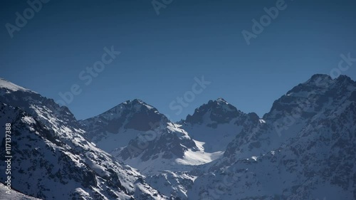 snowy peaks mountain landscape in morocco atlas photo