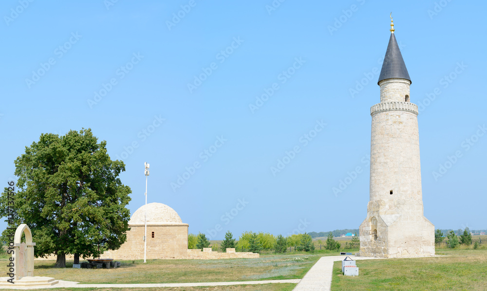 Bolgar city, Tatarstan, Russia - July 26, 2016: Small minaret and Khan's Tomb