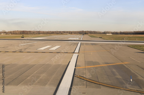Runway marked with a black wheel marks on the runway.