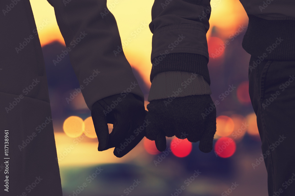 Silhouettes of a couple with de-focused city lights. Stock Photo ...