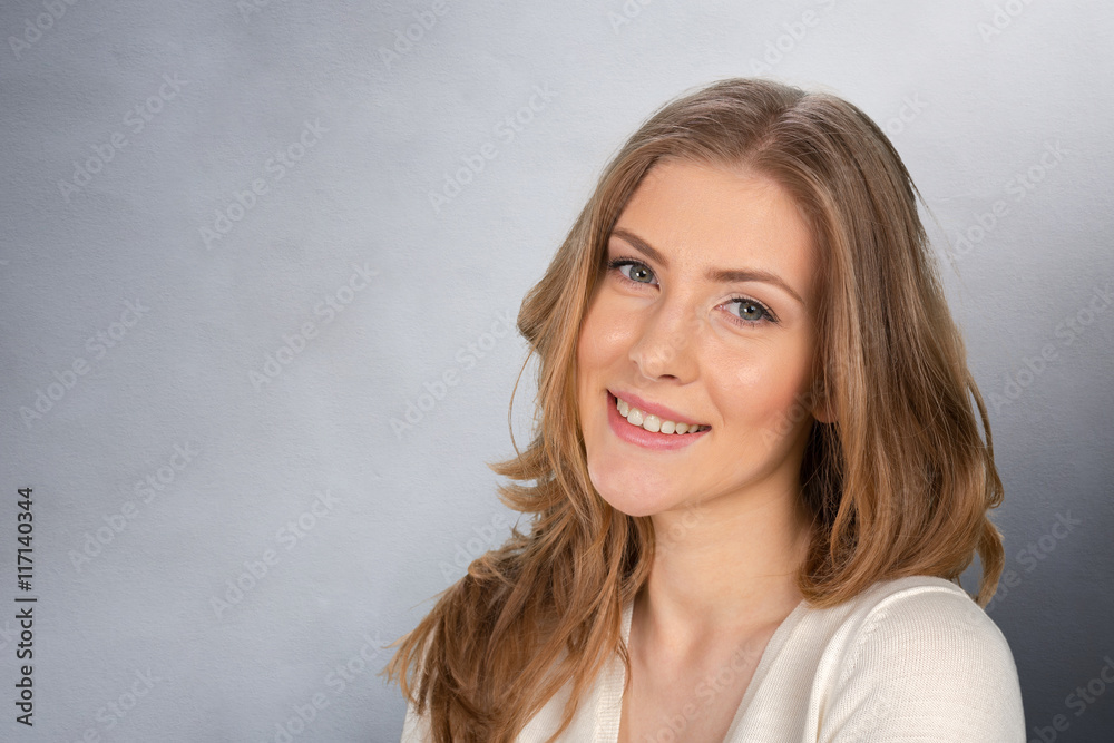 Fototapeta premium portrait of attractive caucasian smiling woman