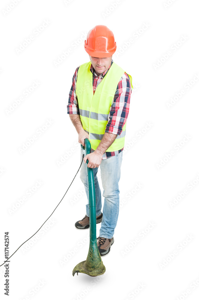 Male constructor using lawn mower for cutting grass