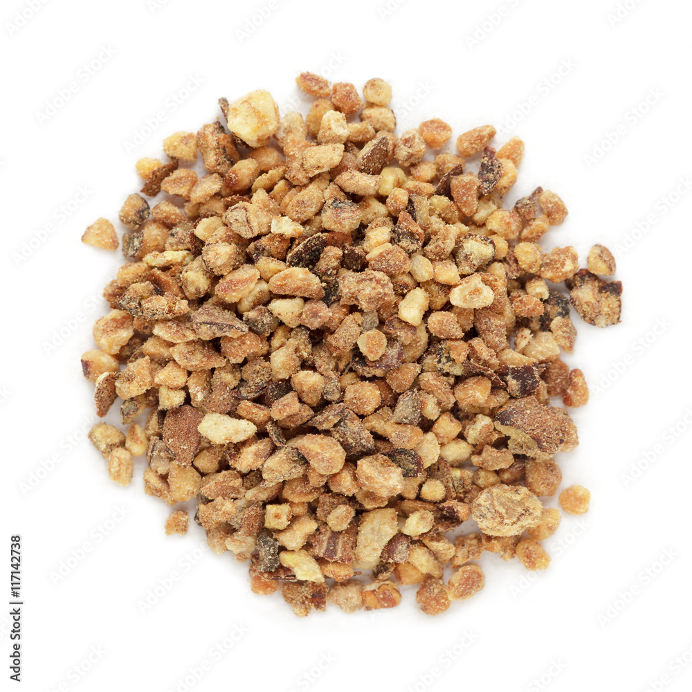 Organic Nutmeg (Myristica fragrans) in big cut size. Isolated on white background. Macro close up. Top view. Organic Nutmeg (Myristica fragrans) in big cut size. Isolated on white background. Macro close up. Top view.