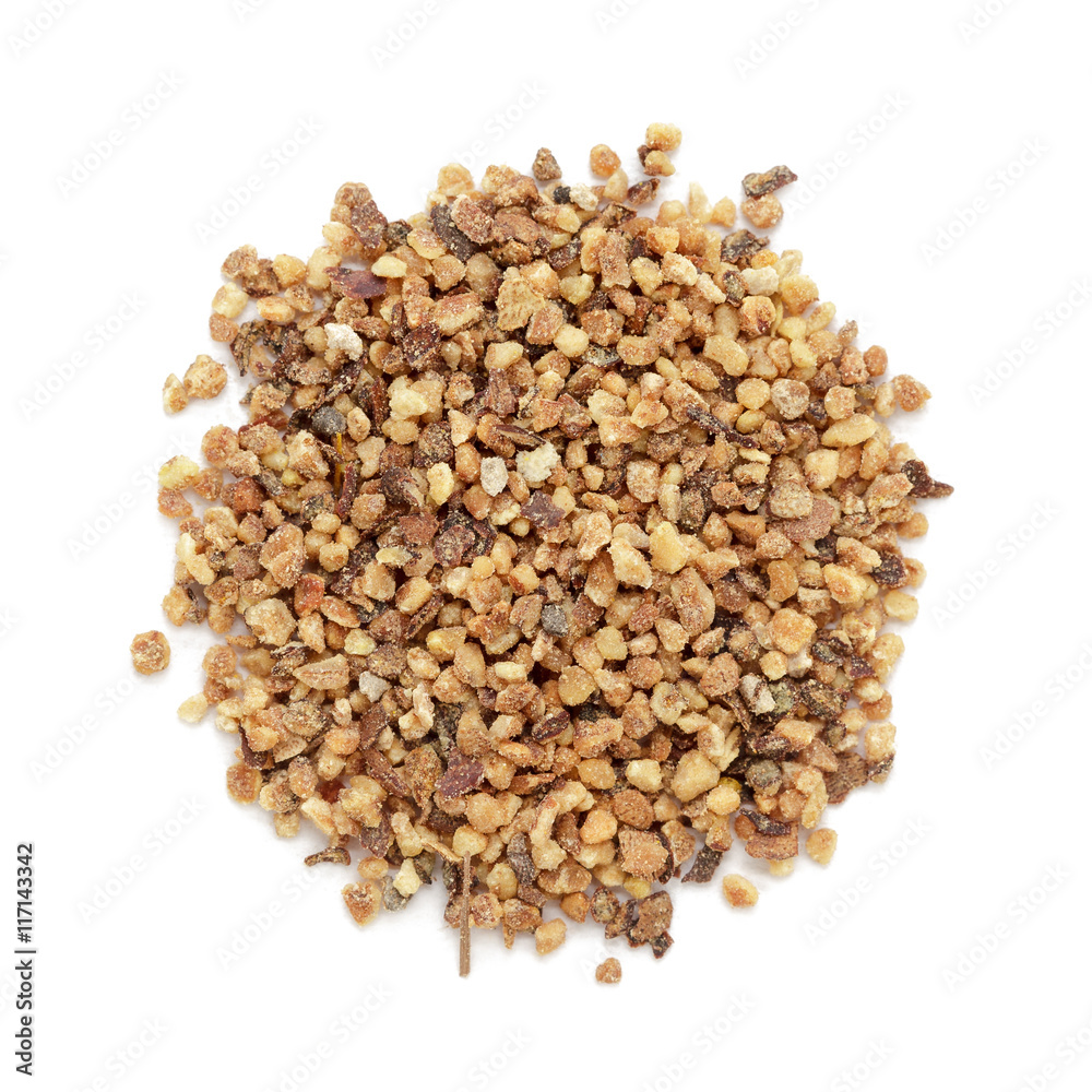 Organic Nutmeg (Myristica fragrans) in tea cut size. Isolated on white background. Macro close up. Top view. Organic Nutmeg (Myristica fragrans) in tea cut size. Isolated on white background. Macro close up. Top view.