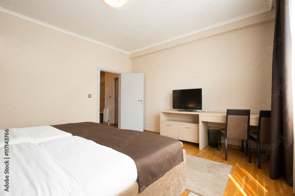 Fototapeta premium Modern elegant hotel bedroom interior