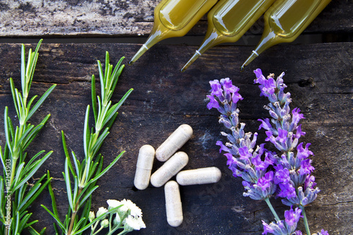 natural medicine products on wooden background
