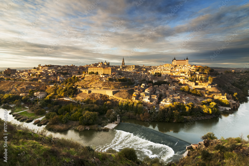 Toledo city , world heritage site , at sunset , with Tajo river