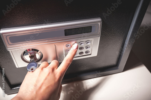 hand opened a safe, close up