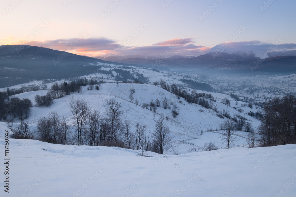 Winter mountain hills at sunrise