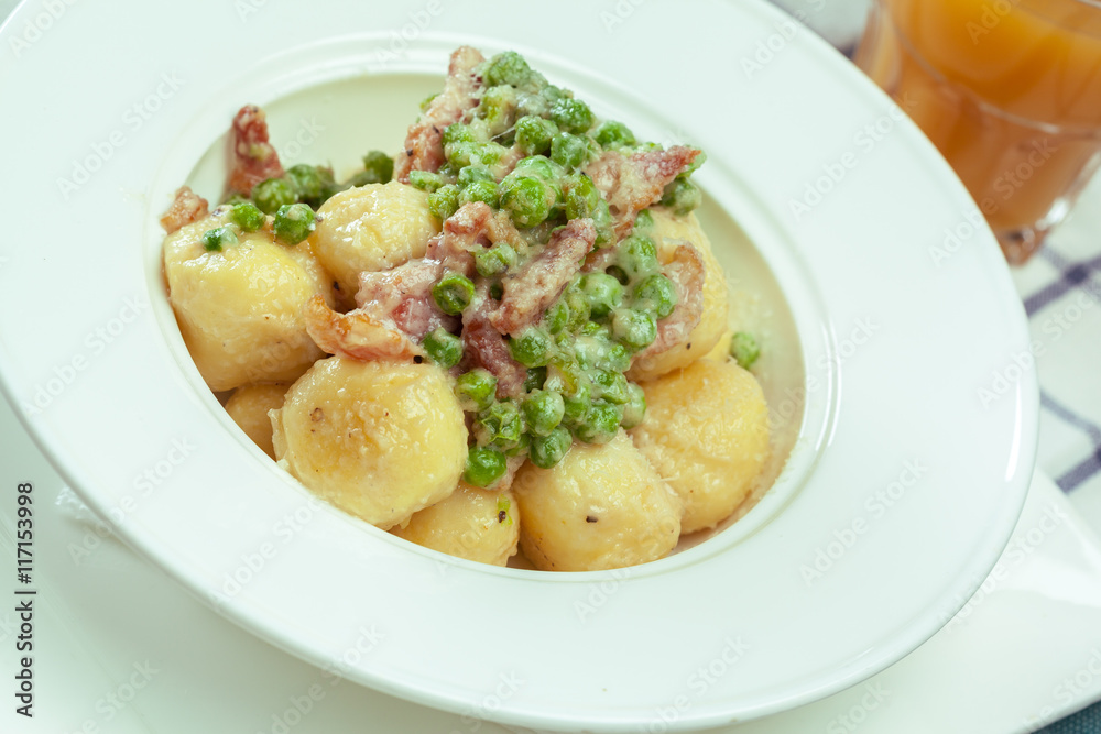 Potato dumplings with fried onion and bacon Potato dumplings with fried onion and bacon