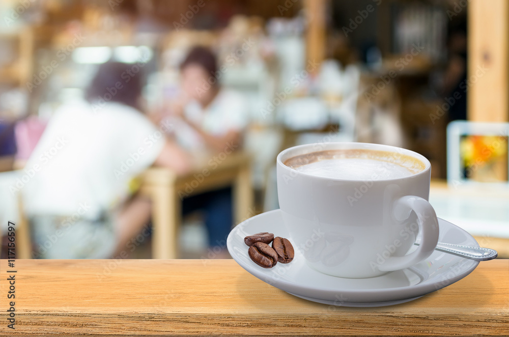 Obraz premium Coffee cup on the table.