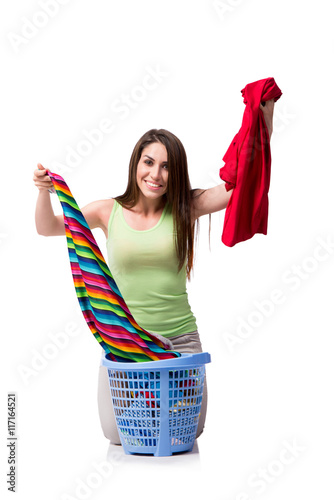 Woman feeling sressed after doing dirty laundry photo