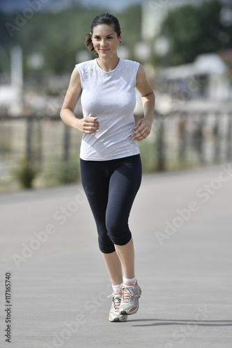 Running woman in the city