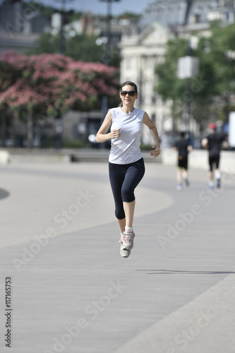 Running woman in the city