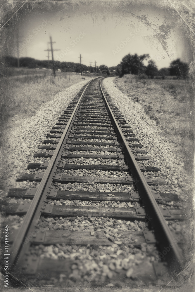 Train tracks with blue sky in Luray, Virginia black and white.