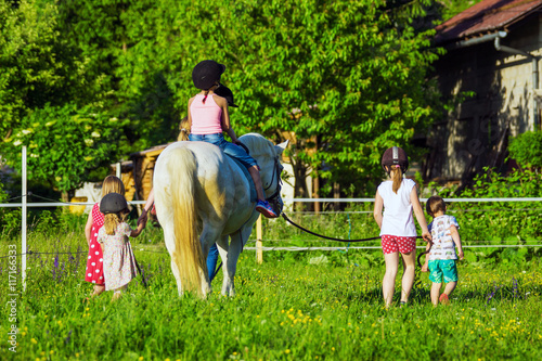Children riding  horse, horse riding school © Daniel Vincek
