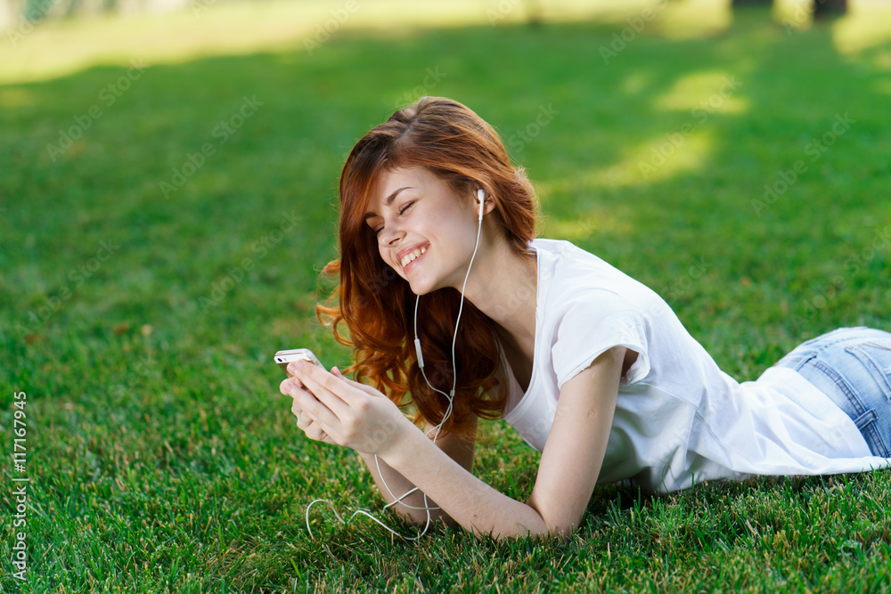Fototapeta premium woman on the grass