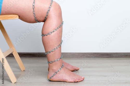 Chain on woman leg