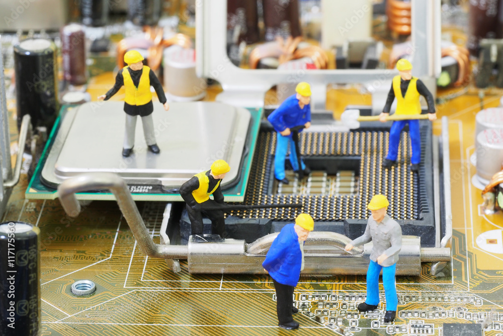 Fototapeta premium Group of engineer workers are installing CPU (Central Processing