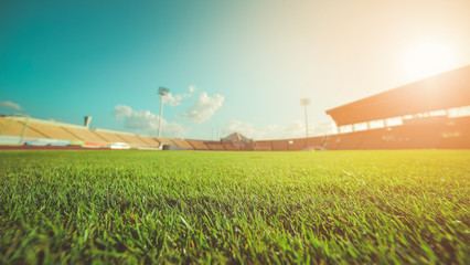 Green grass in soccer stadium , vintage
