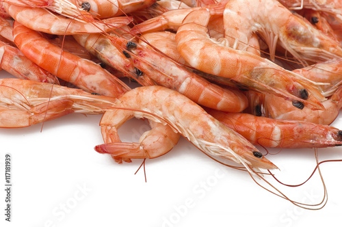 Group of fresh raw shrimp with lemon slice