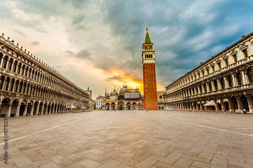 San Marco square with Campanile and Saint Mark's Basilica in sunrise. The main square of the old town. Venice, Italy. photo