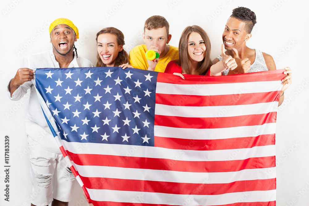 Group of multiracial people holding a american flag Stock Photo Adobe