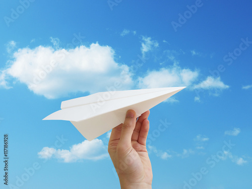 paper plane throwing sky