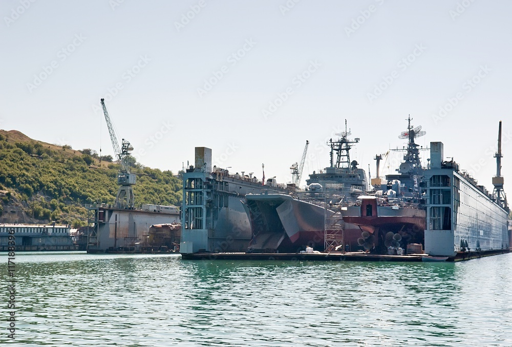 Floating dry dock with two landing crafts. Floating dry dock with two landing crafts.