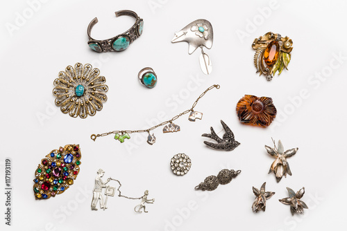 Vintage antique jewelry collection isolated on a light background