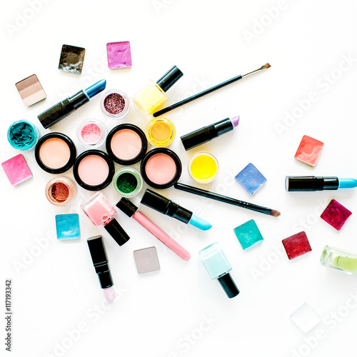 flat lay female cosmetics collage with lipstick, brush on white background. top view set