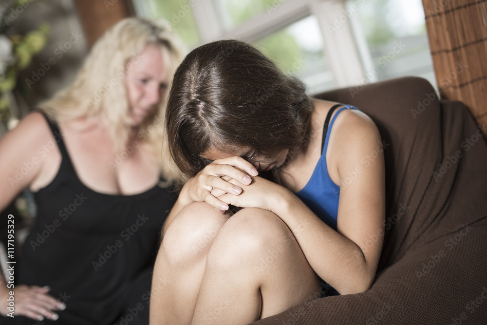 Sad Teen on sofa have some bad moment at home Sad Teen on sofa have some bad moment at home