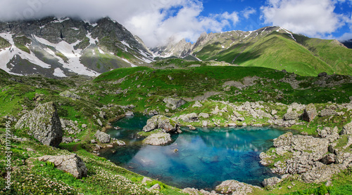Picturesque lake in valley of Caucasus mountains