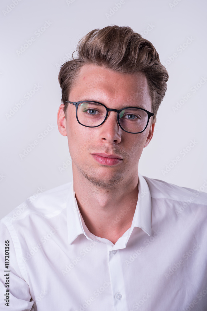 Portrait of a young business man in white shirt Portrait of a young business man in white shirt