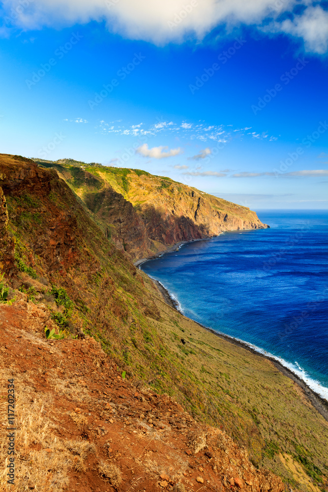 Beautiful Madeira landscape with azure water and green cliffs, Portugal