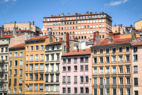 Typical facades of the houses in Lyon, France on the banks of the Saone river 