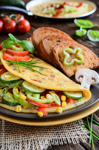 Omelet with pepper, tomato, corn, green onion, cucumber, mushroo