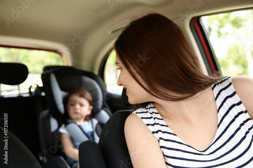 Mother and child in car. Safety driving concept © Africa Studio