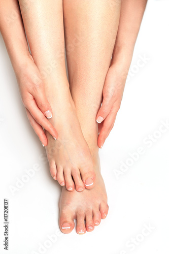 Beautiful feet with perfect spa french nail pedicure © panigystovska