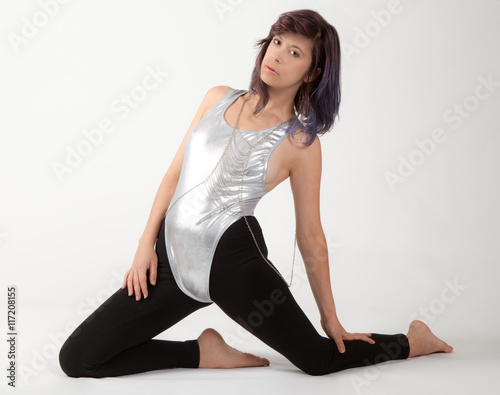 Fit Woman in Shiny Silver Leotard and Black Leggings
