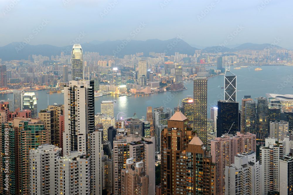 Hong Kong Skyline and Victoria Harbour at dusk from Victoria Peak on Hong Kong Island.