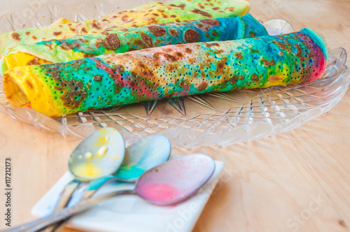 Rainbow coloured pancakes photo