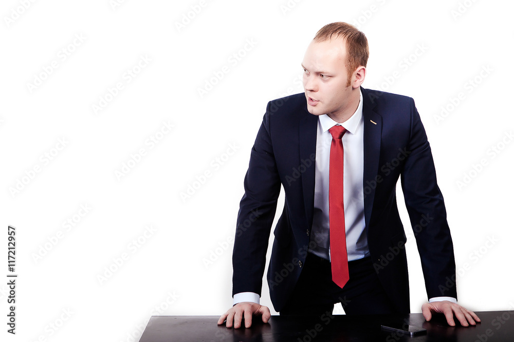 Businessman frustrated with his work. Isolated on white backgrou Businessman frustrated with his work. Isolated on white backgrou