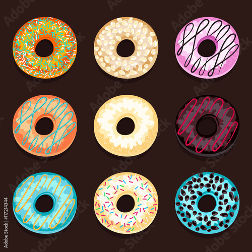 Set of donuts isolated on a brown background.