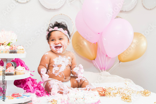 Baby Girl With Cake and Balloons